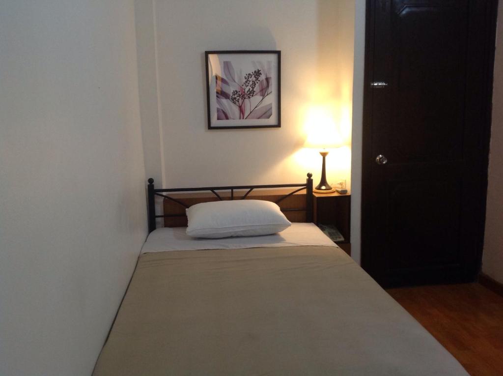 Postel nebo postele na pokoji v ubytování Memory Hotel