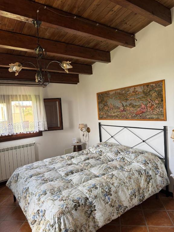 Postel nebo postele na pokoji v ubytování Le Macine 1868