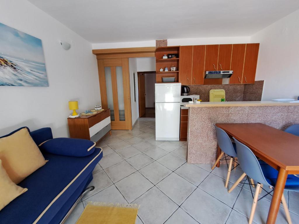 Kuchyň nebo kuchyňský kout v ubytování Apartments Galović