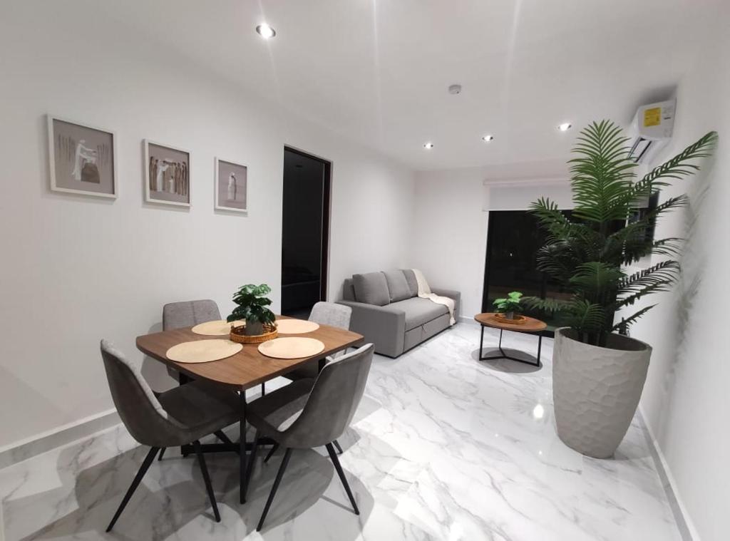 TV a/nebo společenská místnost v ubytování New apartment on the ground floor in CUN