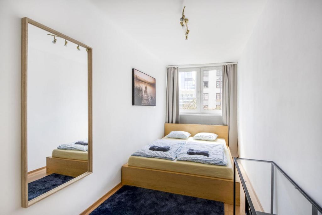 Posteľ alebo postele v izbe v ubytovaní Pańska Residence