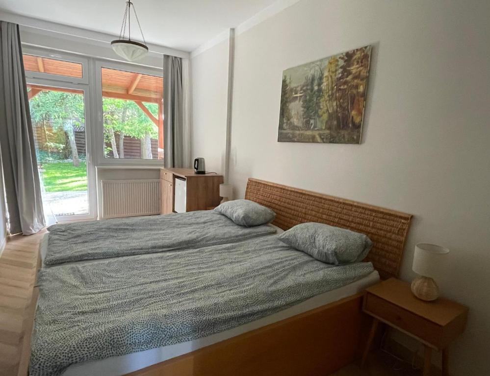 Postel nebo postele na pokoji v ubytování WILLA BOHEMA