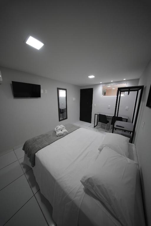 Postel nebo postele na pokoji v ubytování BSH - Bangalô Smart Home