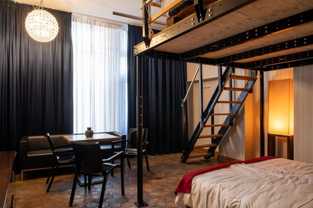 Postel nebo postele na pokoji v ubytování Hotel Adele am Alex