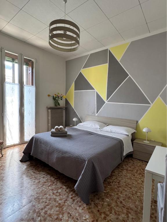 Postel nebo postele na pokoji v ubytování Giove Rooms