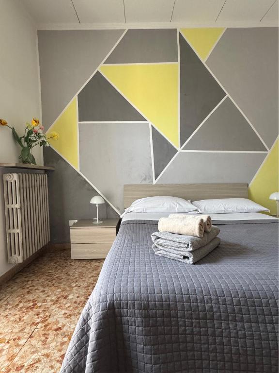 Postel nebo postele na pokoji v ubytování Giove Rooms