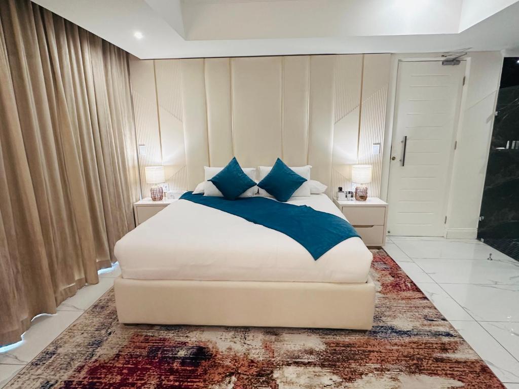 Katil atau katil-katil dalam bilik di H & H Boutique & SPA