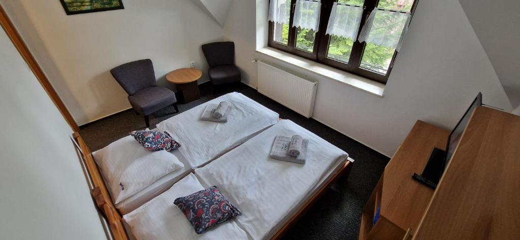 Letto o letti in una camera di Vila Jedľa