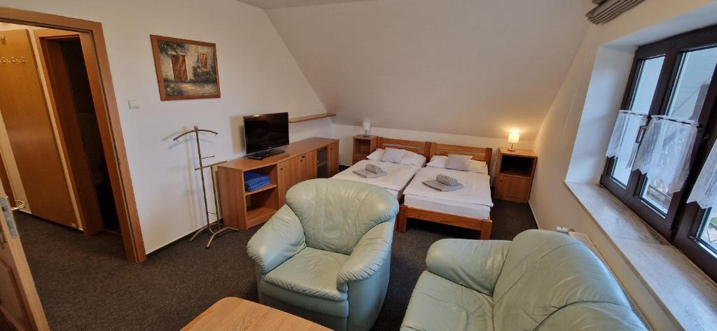 Letto o letti in una camera di Vila Jedľa