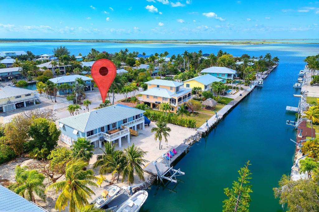 an aerial view of a resort with a red marker at Our Happy Place in Sugarloaf Shores