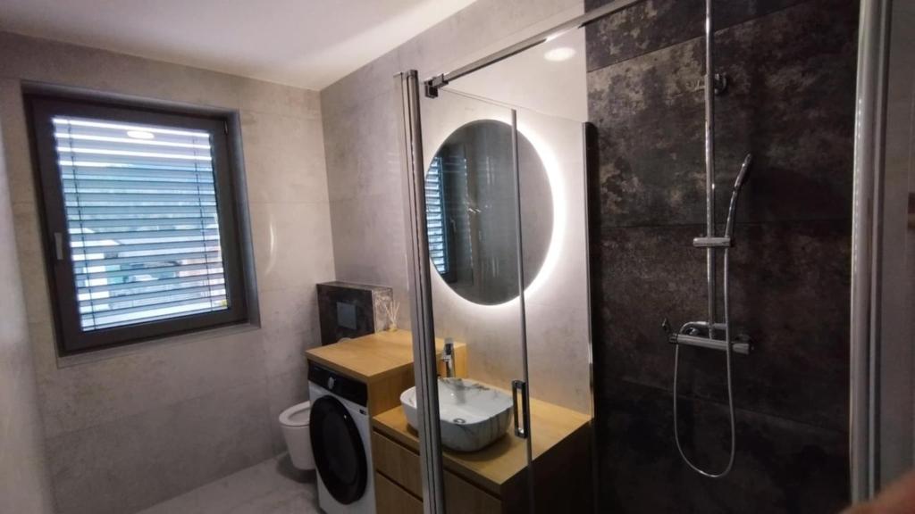 Koupelna v ubytování Apartmány Anami