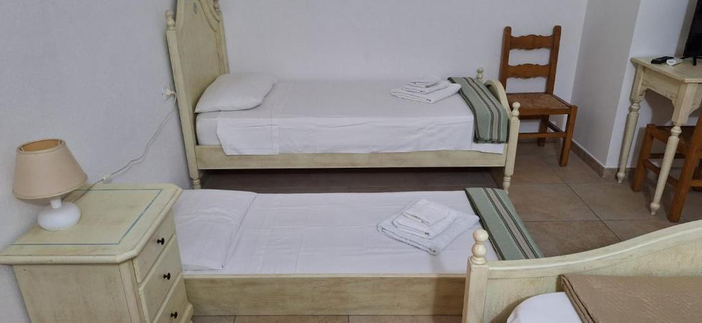 Postel nebo postele na pokoji v ubytování Nurache