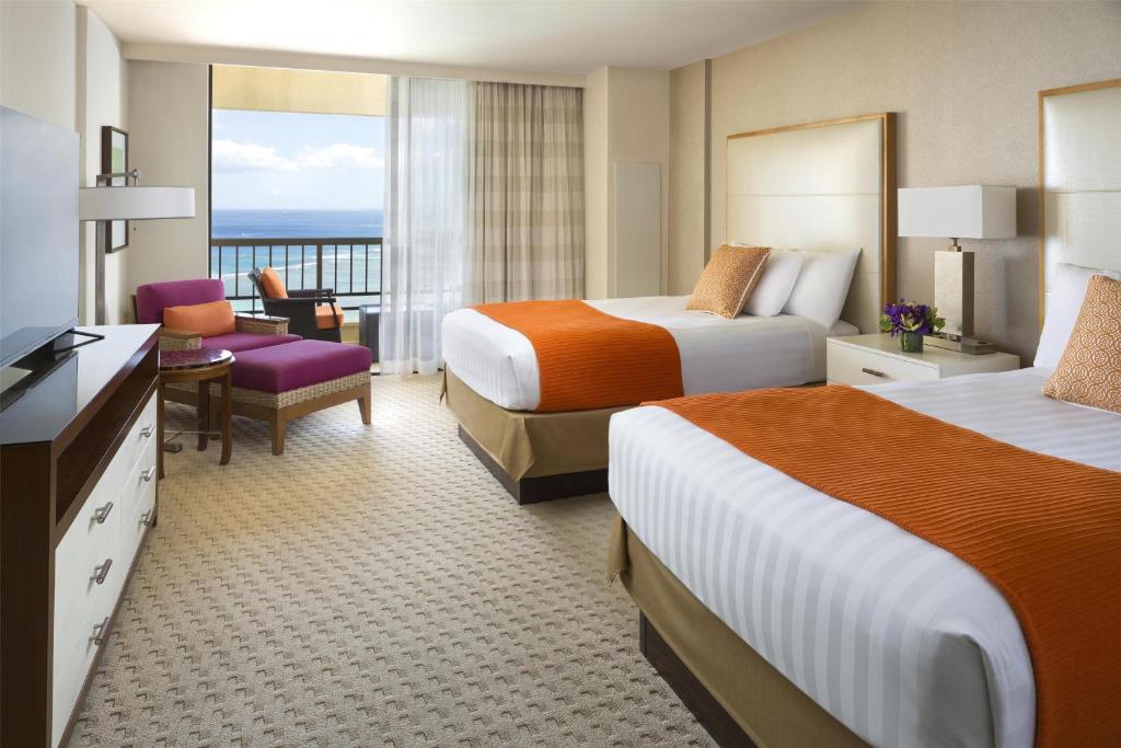 Postel nebo postele na pokoji v ubytování Hyatt Regency Waikiki Beach Resort & Spa