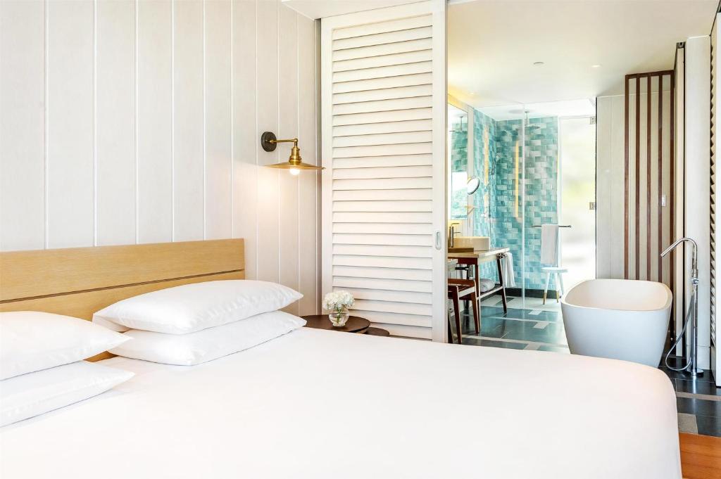 Postel nebo postele na pokoji v ubytování Park Hyatt St. Kitts