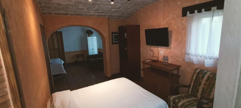 TV a/nebo společenská místnost v ubytování Rancho Labradores