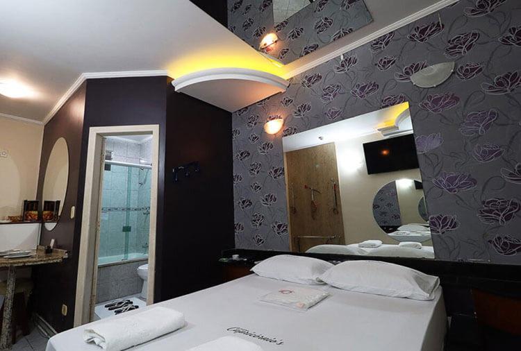 Postel nebo postele na pokoji v ubytování MOTEL CAPRICÓRNIOS