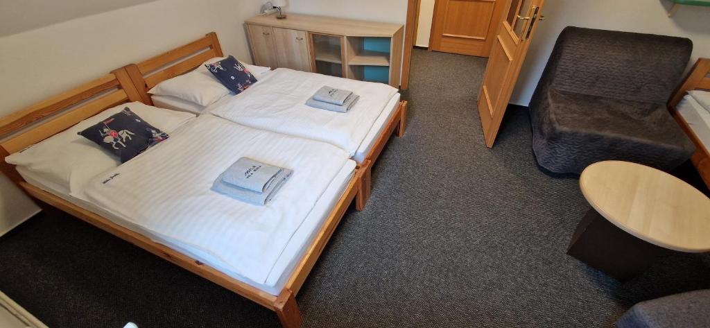 Letto o letti in una camera di Vila Jedľa