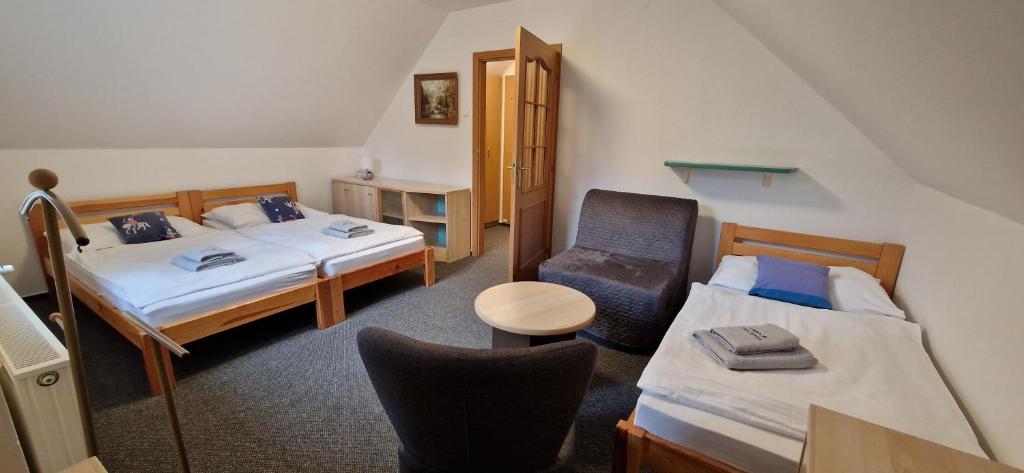 Letto o letti in una camera di Vila Jedľa