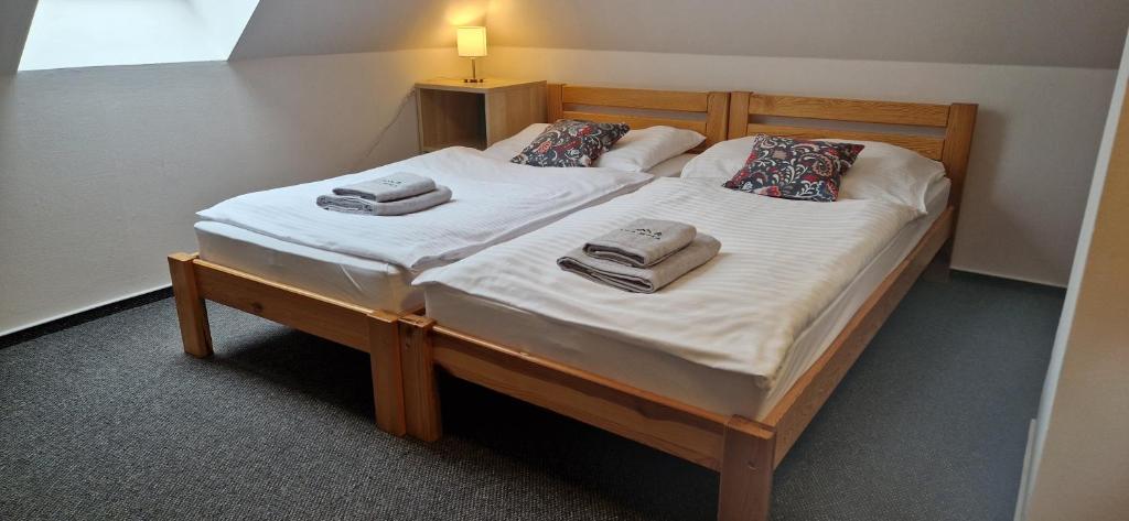 Letto o letti in una camera di Vila Jedľa