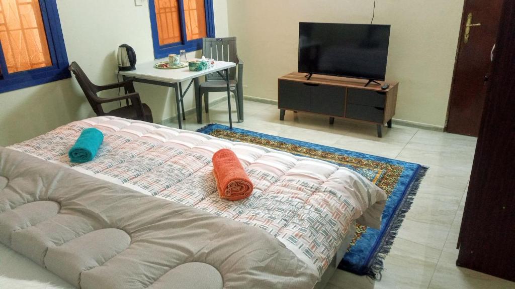 TV a/nebo společenská místnost v ubytování SALEM House Hostel Nizwa