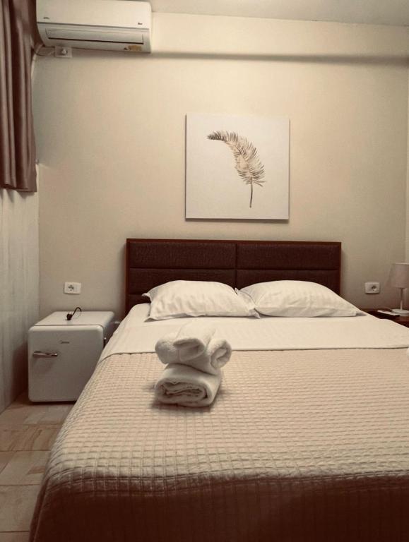 Postel nebo postele na pokoji v ubytování Bobi Hotel