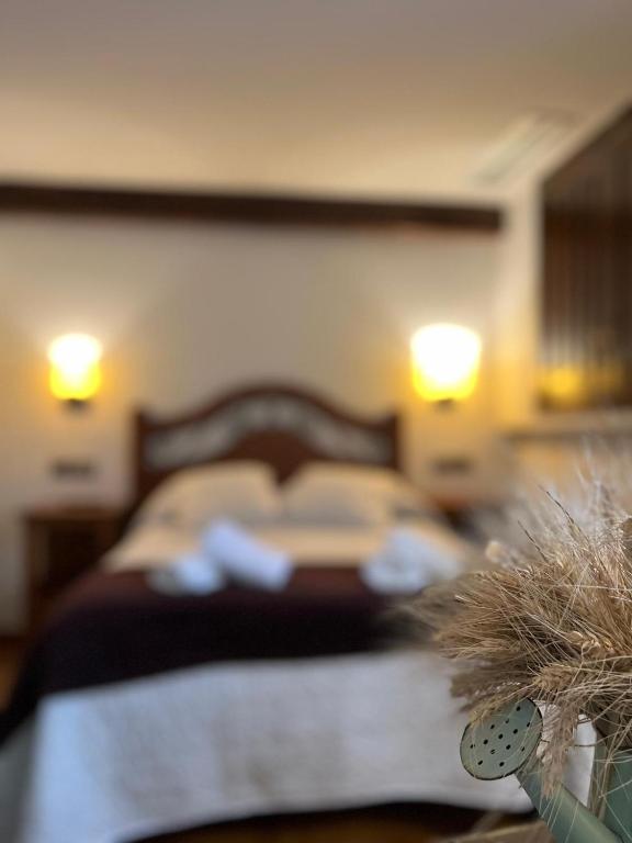Postel nebo postele na pokoji v ubytování Fonda Carrera