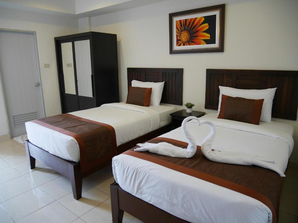 Una cama o camas en una habitación de Top Hostel (Top Mansion)