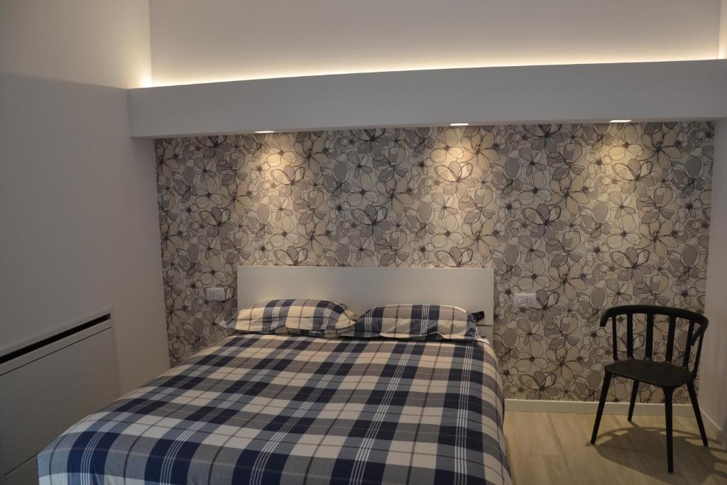 Postel nebo postele na pokoji v ubytování In Centro Glam