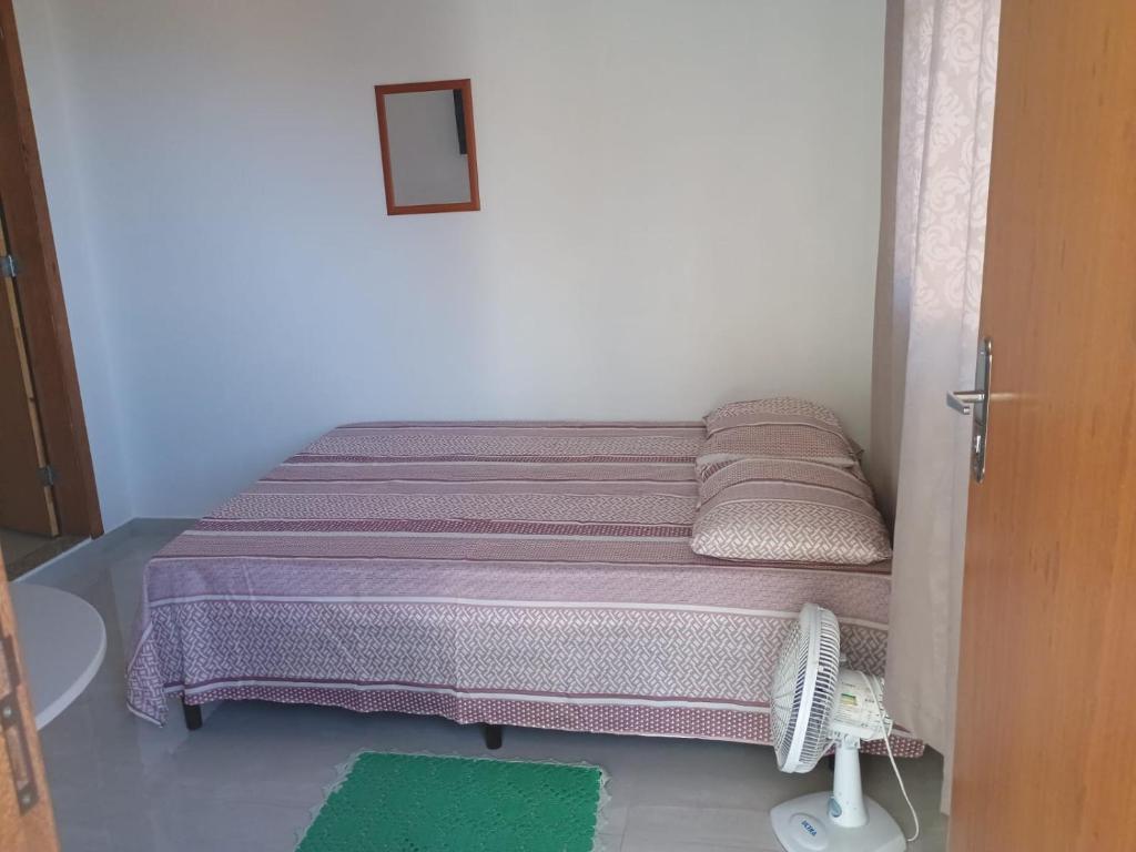Postel nebo postele na pokoji v ubytování recanto Provetá 1 ILHA GRANDE