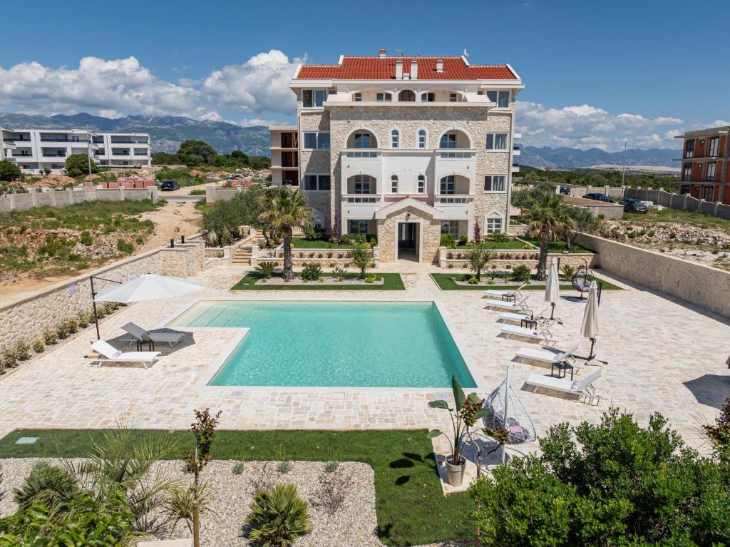 Apartments with swimming pool Novalja, Pag - 24151