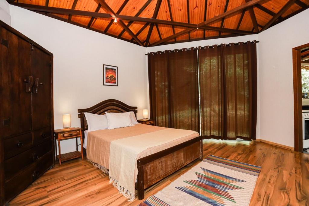 Postel nebo postele na pokoji v ubytování Casa em Moeda-MG