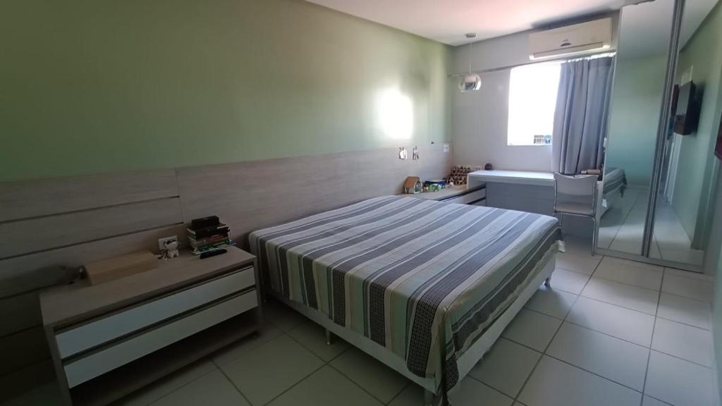 Ένα ή περισσότερα κρεβάτια σε δωμάτιο στο Apt em Arcoverde