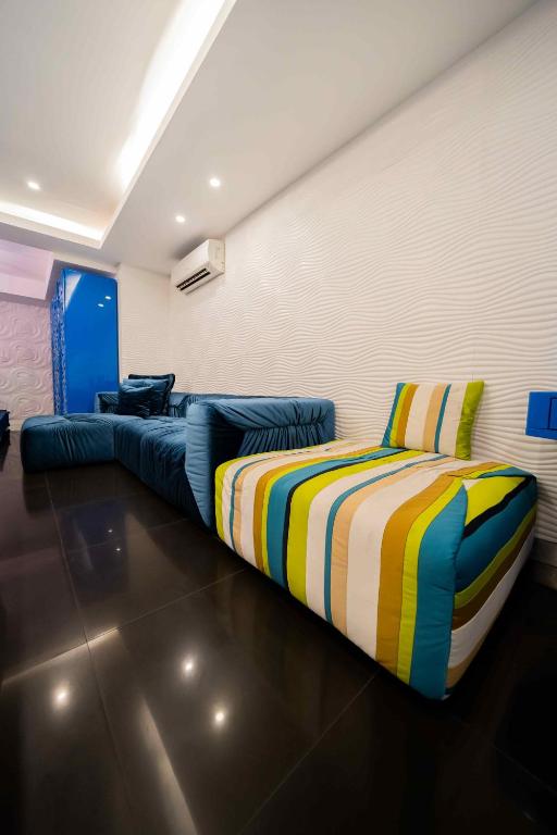 Postel nebo postele na pokoji v ubytování Luks Lofts Hotel & Residences