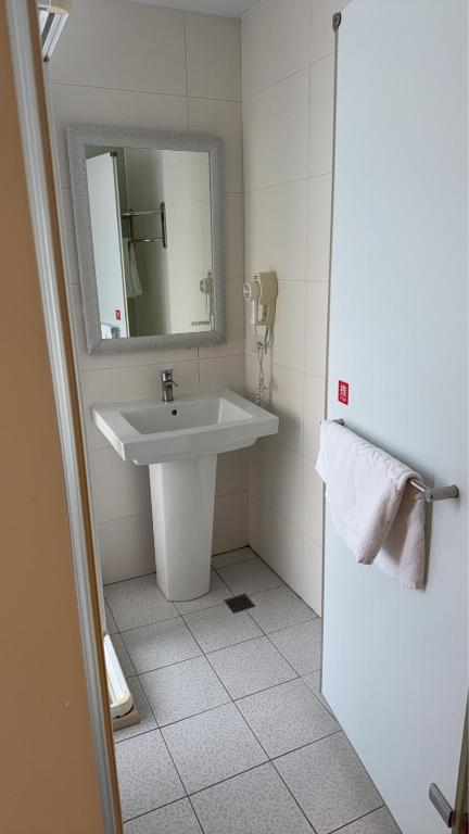 Koupelna v ubytování 成都壹壹壹商旅