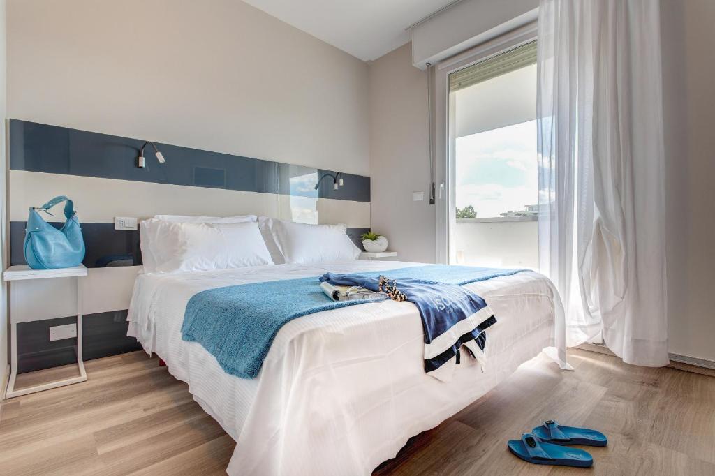 Postel nebo postele na pokoji v ubytování B&B Isabella