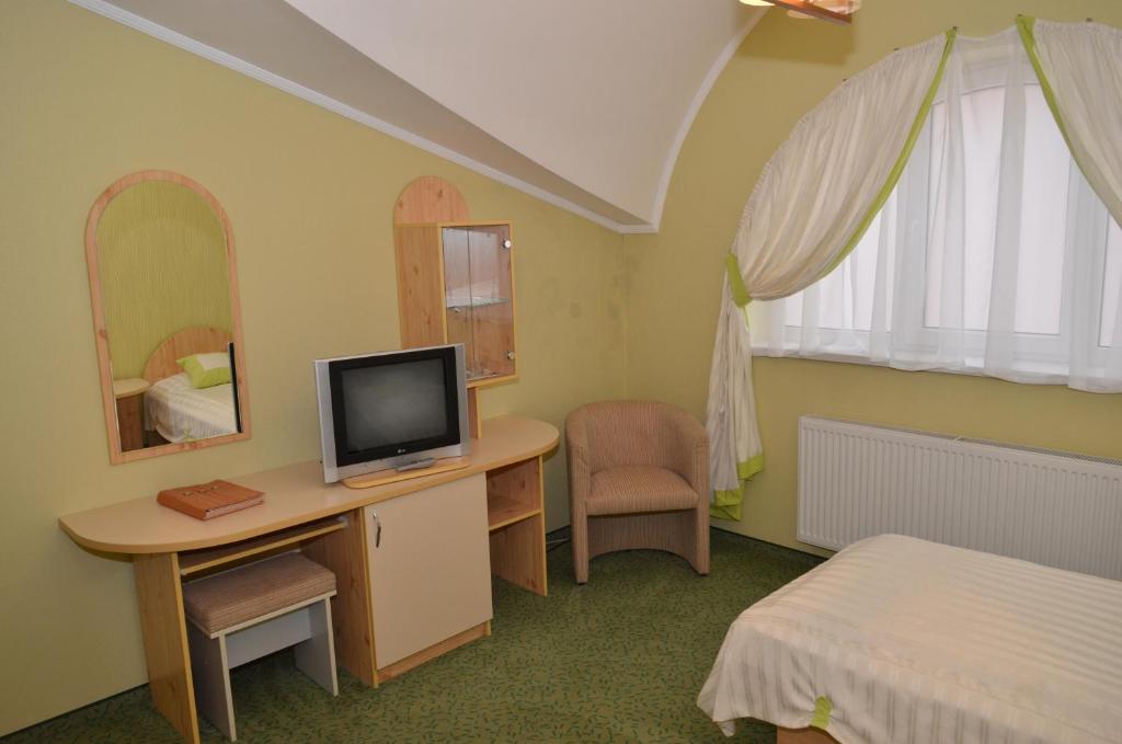 TV a/nebo společenská místnost v ubytování Hotel Serpanok