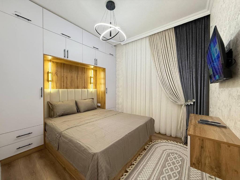 Postel nebo postele na pokoji v ubytování OS Shaumyana