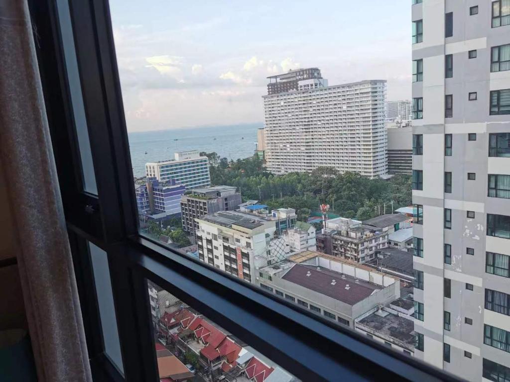 a view from a window of a city at 芭提雅市中心The Base 高端公寓酒店 in Pattaya