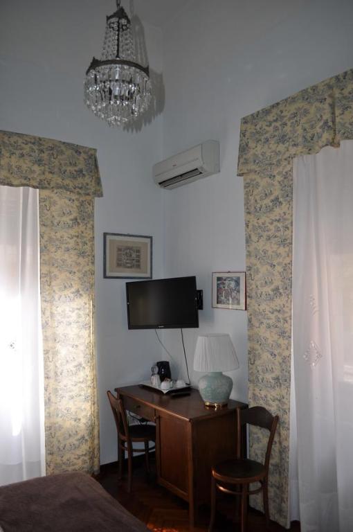 TV a/nebo společenská místnost v ubytování Villa L'Aurora