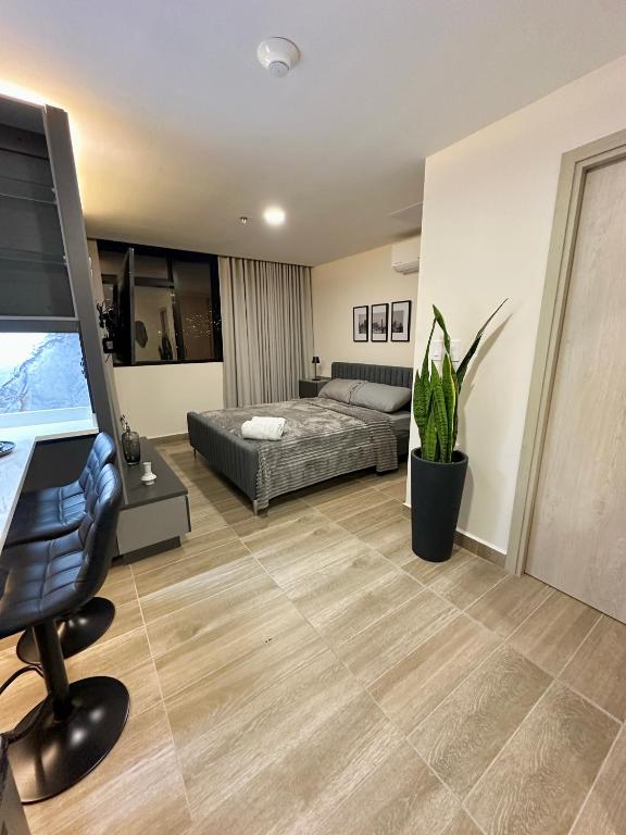Postel nebo postele na pokoji v ubytování Cómodo y Lujoso Apartamento en Artemisa