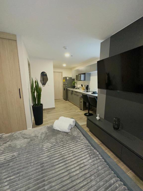 Postel nebo postele na pokoji v ubytování Cómodo y Lujoso Apartamento en Artemisa