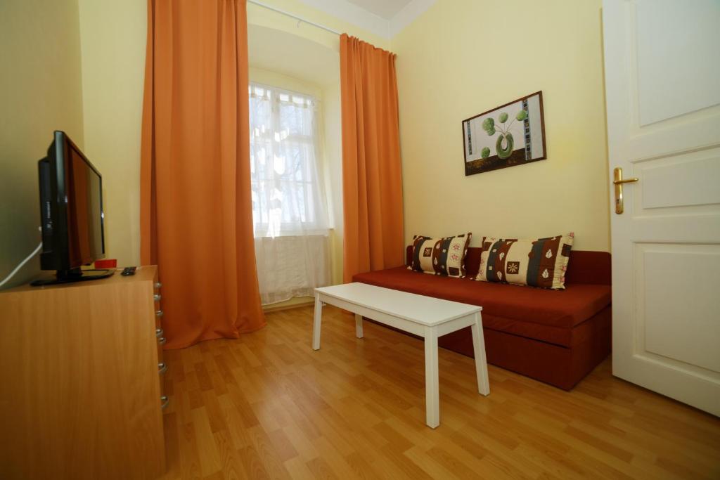 TV a/nebo společenská místnost v ubytování Chateau Diva