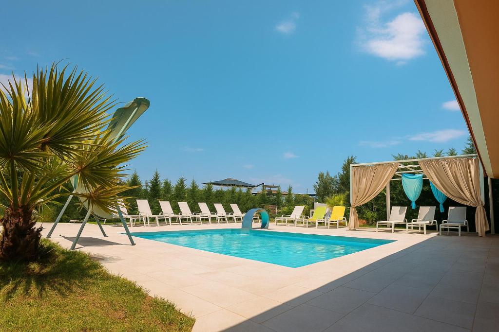 Φωτογραφία από το άλμπουμ του Aquamare Studios - Chalkidiki Poolside Getaways στο Πευκοχώρι