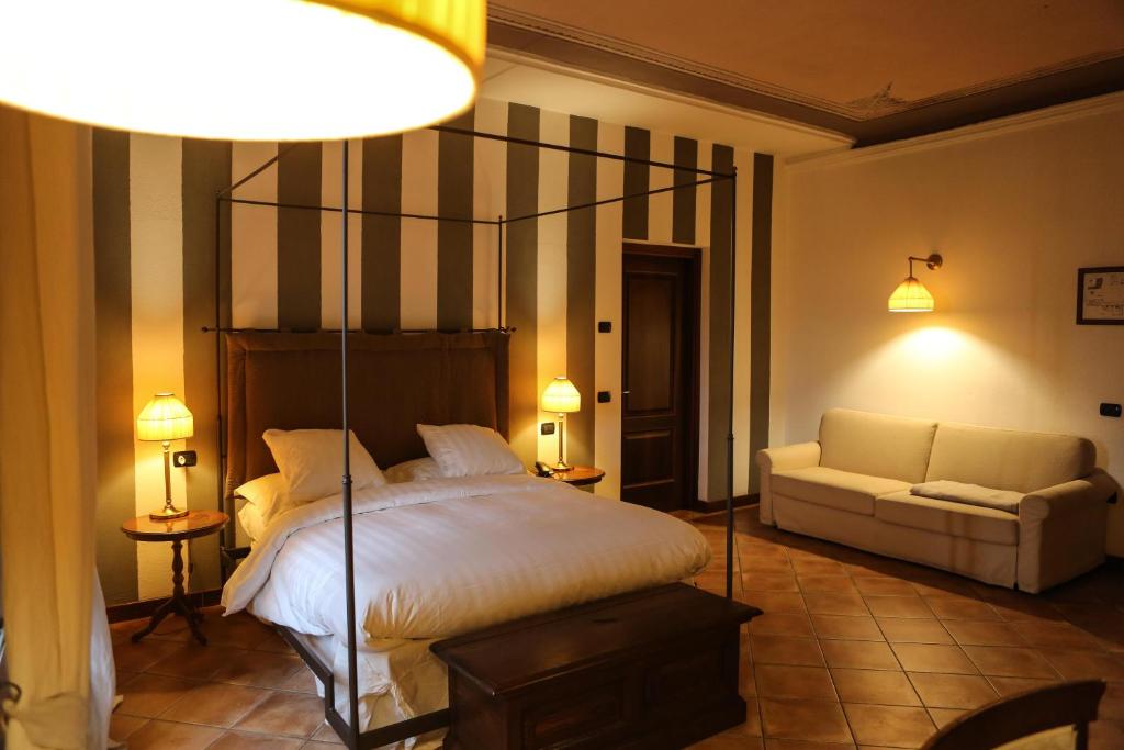 Postel nebo postele na pokoji v ubytování Al Castello Resort
