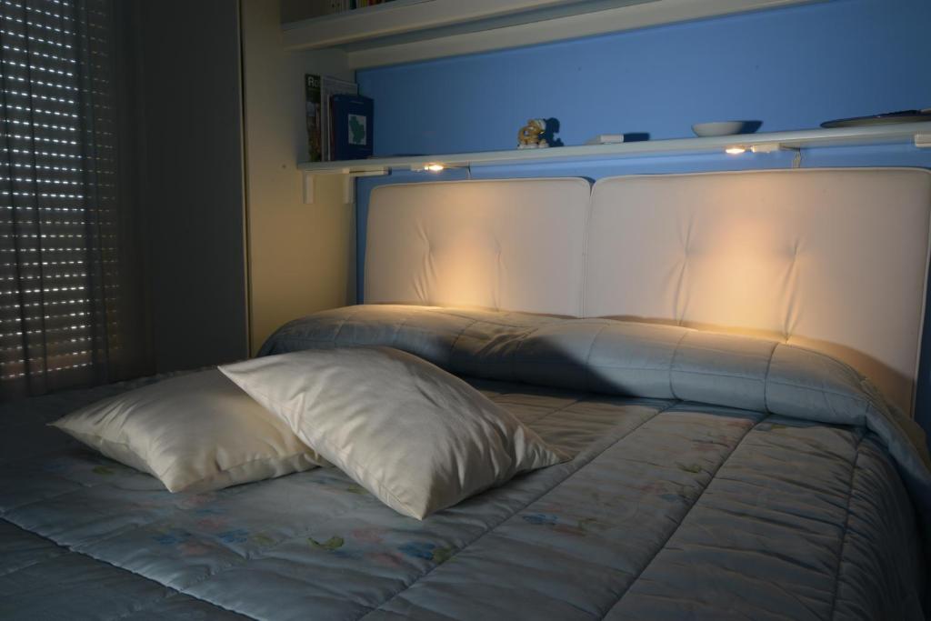 Postel nebo postele na pokoji v ubytování B&B Il Cielo Sui Sassi