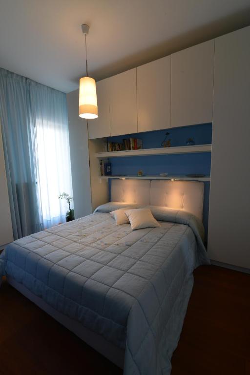 Postel nebo postele na pokoji v ubytování B&B Il Cielo Sui Sassi