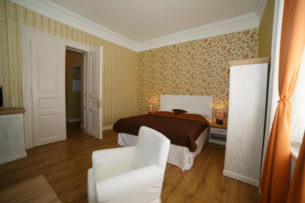 Postel nebo postele na pokoji v ubytování Chateau Diva
