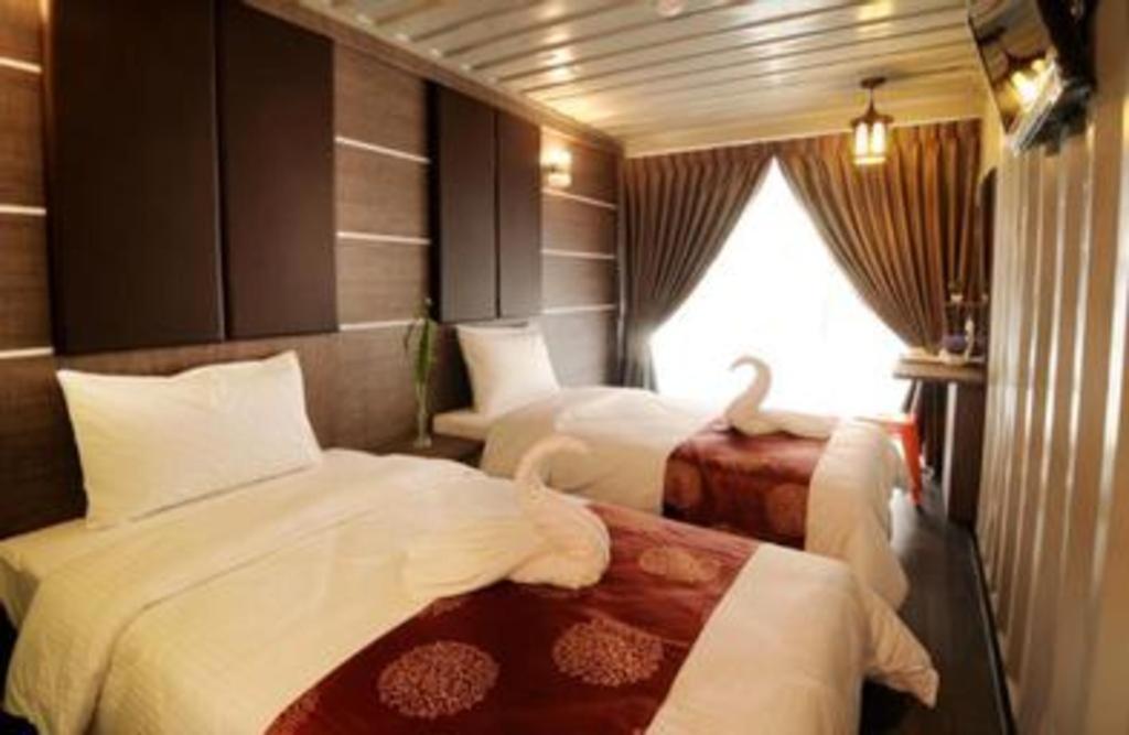 PPT Muar Hotelにあるベッド