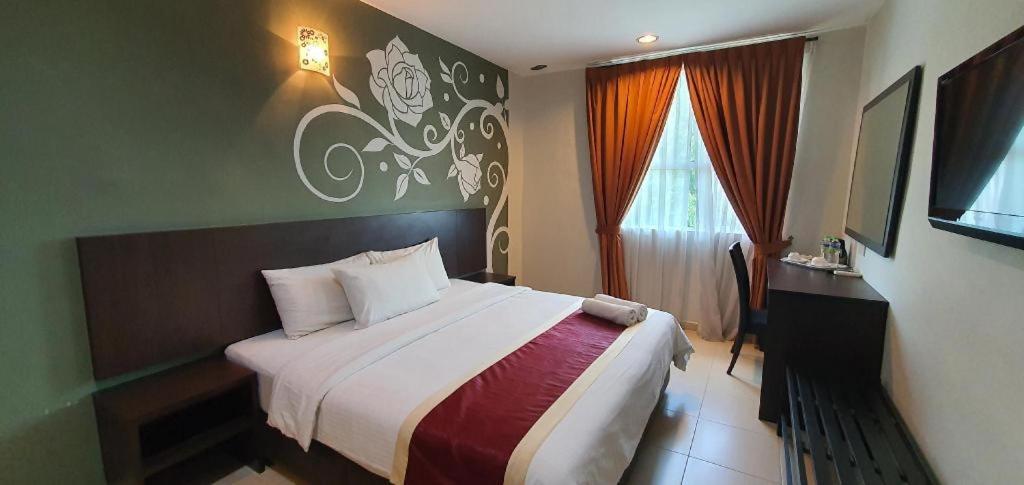 PPT Muar Hotelにあるベッド