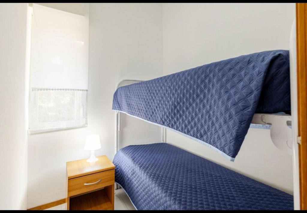 Posteľ alebo postele v izbe v ubytovaní Perla Home Speciale Vacanze 2025 Casa perfetta per gruppi coppie e famiglie vivi la Sicilia a modo tuo